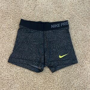 Women’s Nike Pro shorts. Size S. Colors: gray and black